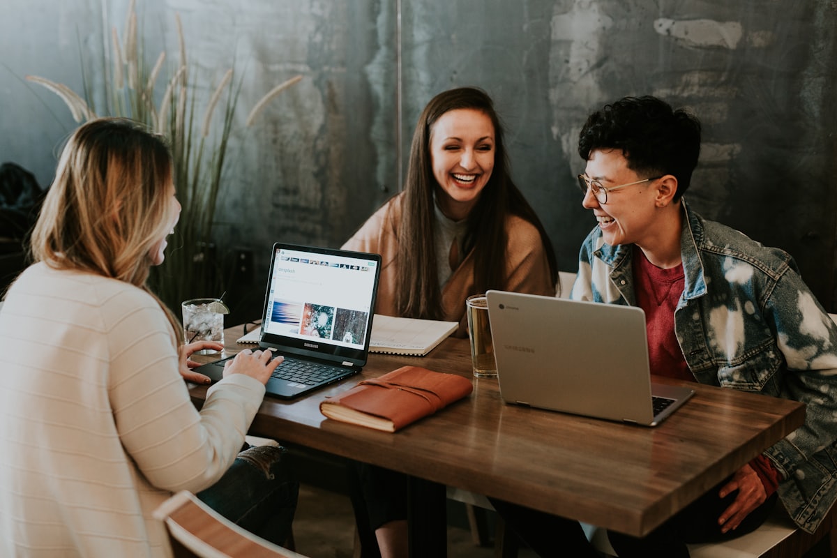 Small business team working together around a table