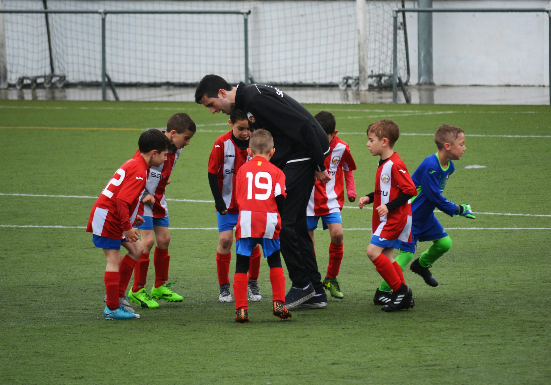 Young people training together at a community sports session